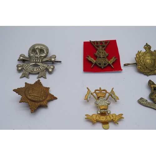 51 - 16 Military Cap/Regiment badges