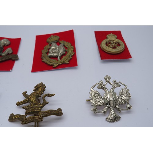 52 - 15 Military Cap/Regiment badges