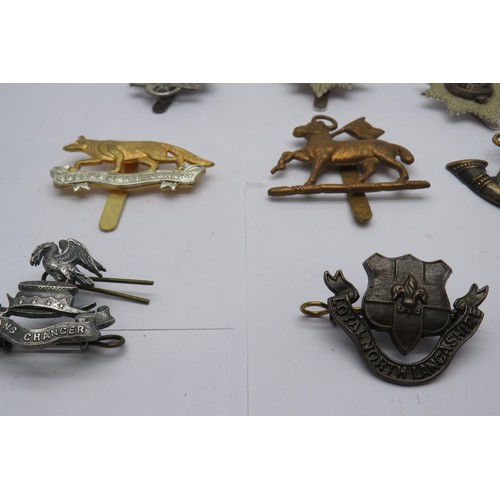 53 - 15 Military Cap/Regiment badges