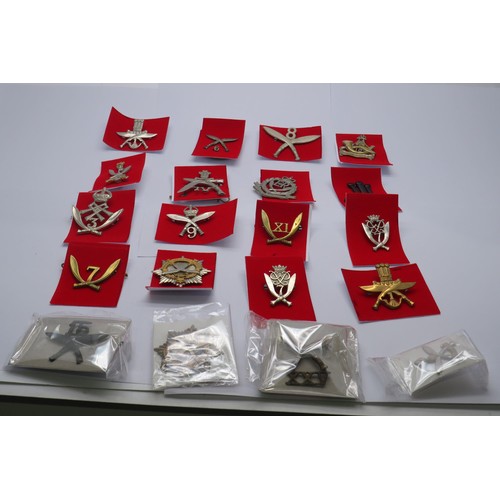 55 - 20 Military Cap/Regiment badges