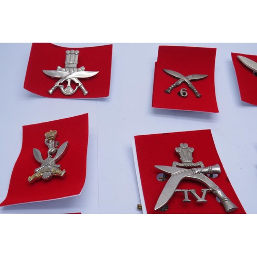 55 - 20 Military Cap/Regiment badges