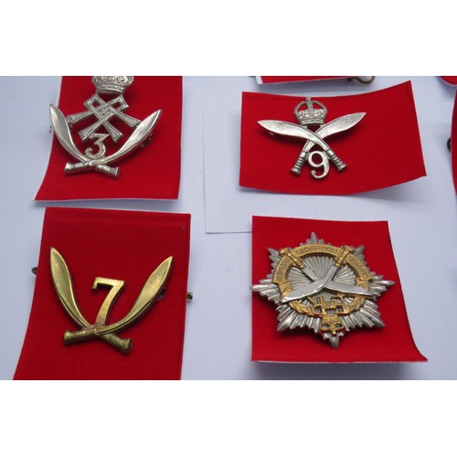 55 - 20 Military Cap/Regiment badges