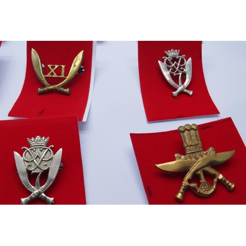 55 - 20 Military Cap/Regiment badges