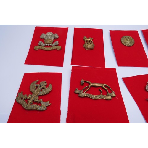 7 - 16 Military cap/Regiment badges