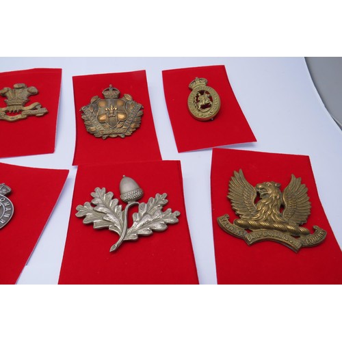 7 - 16 Military cap/Regiment badges