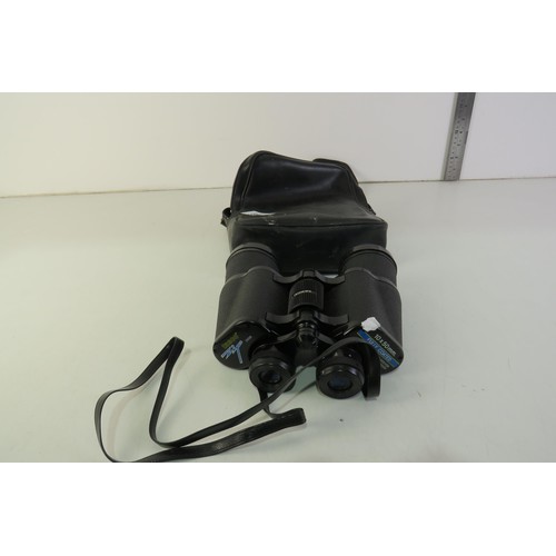 399 - Tasco binoculars with lens covers and carry bag