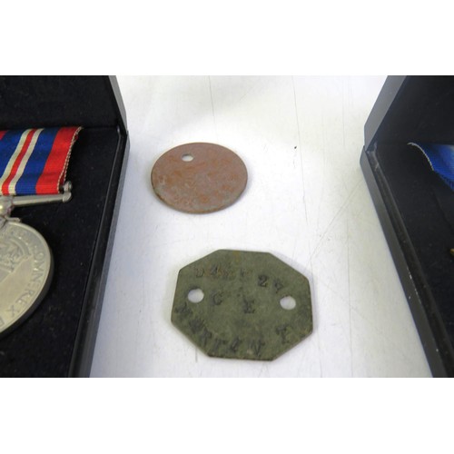 533 - WWII Atlantic star trio and dog tags, national service ,edal and womans ward army medal