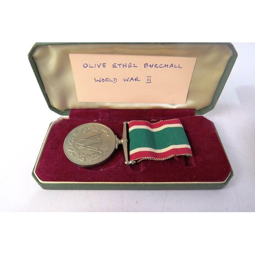 534 - National service and suez canal medals sgt mop gardner woman's voluntary service medal named