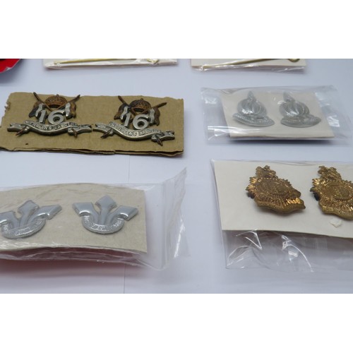 547 - 30 Military cap/Regiment badges