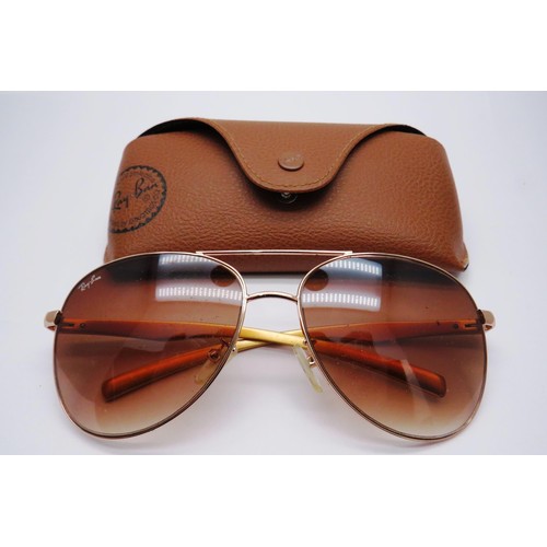 562 - Rayban Sunglasses in case