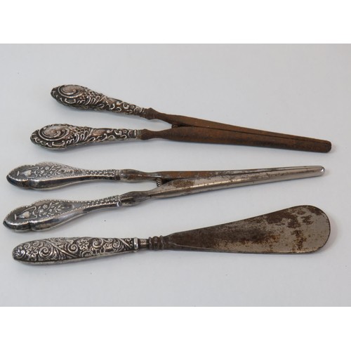 109 - Three silver handle items