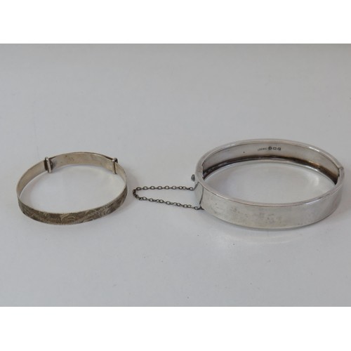 127 - Two silver bangles-30g