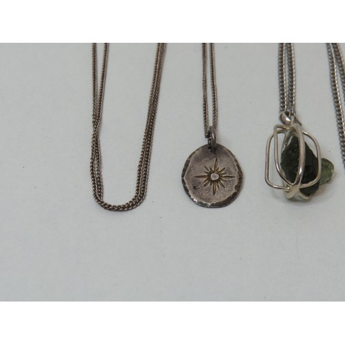 255 - Three silver necklaces