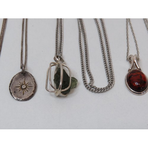 255 - Three silver necklaces