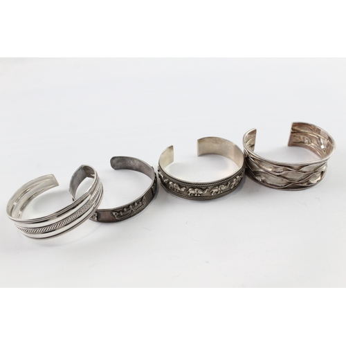 66 - Collection of Sterling Silver Bangles inc. Elephant, Traditional x 4 97g