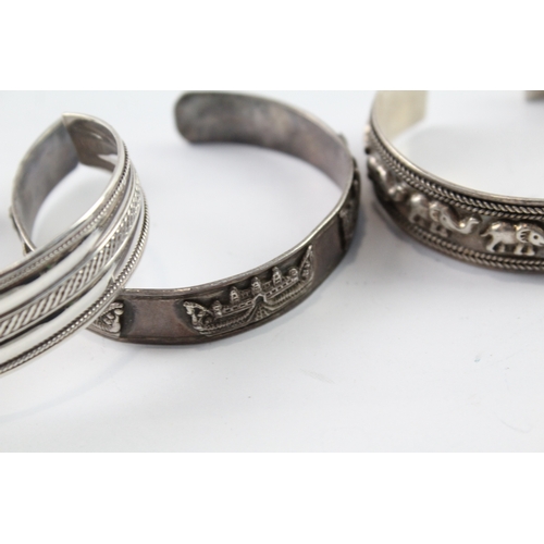 66 - Collection of Sterling Silver Bangles inc. Elephant, Traditional x 4 97g