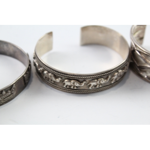 66 - Collection of Sterling Silver Bangles inc. Elephant, Traditional x 4 97g