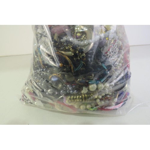 99 - 10kg bag of costume jewellery.