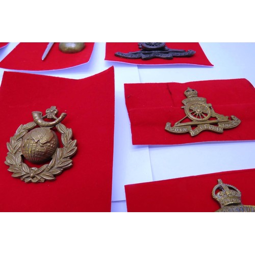 22 - 20 Military cap/Regiment badges