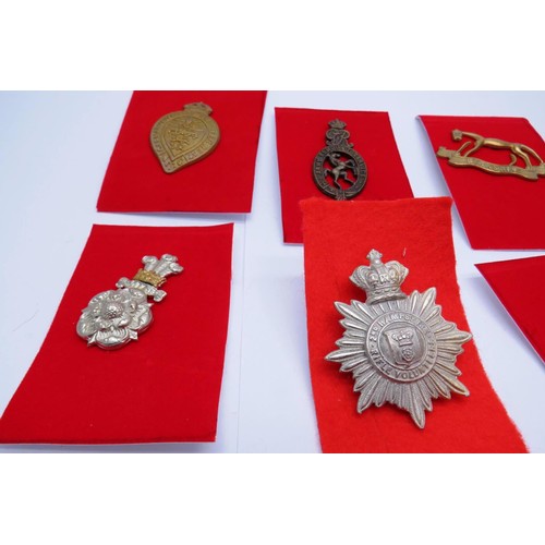 27 - 18 Military cap/Regiment badges