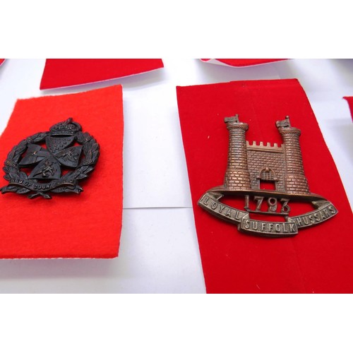 27 - 18 Military cap/Regiment badges