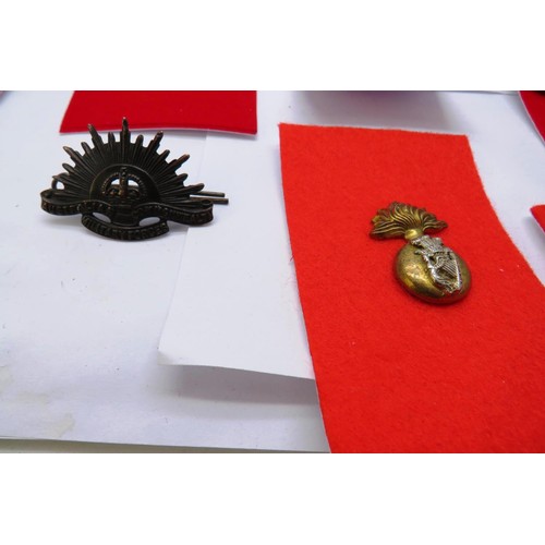 27 - 18 Military cap/Regiment badges