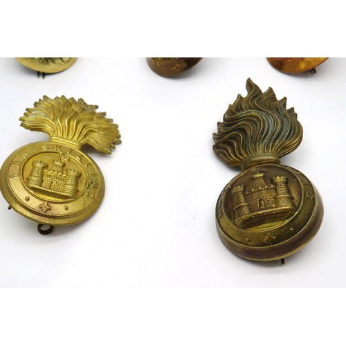 34 - 5 Military cap/Regiment badges