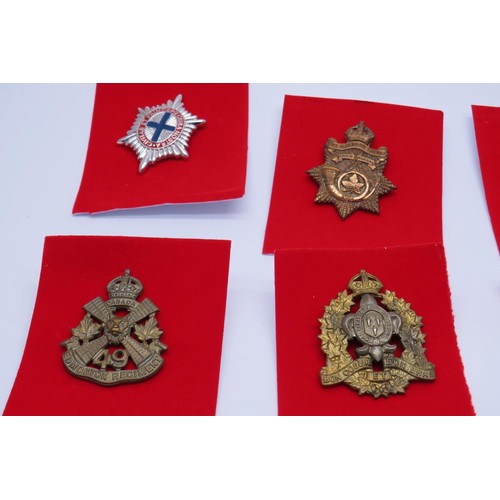 38 - 13 Military cap/Regiment badges