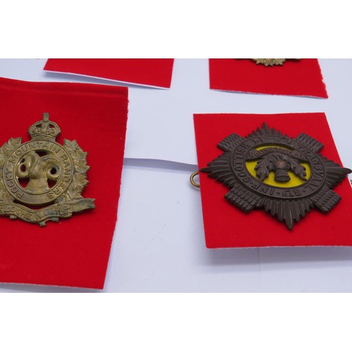 38 - 13 Military cap/Regiment badges