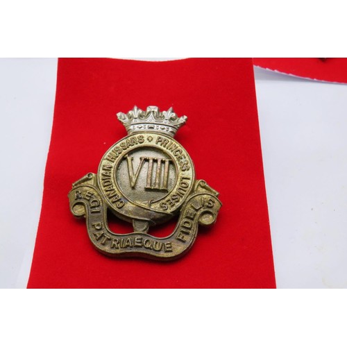 38 - 13 Military cap/Regiment badges