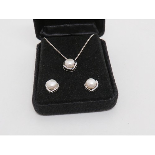 155 - Boxed silver and pearl necklace set