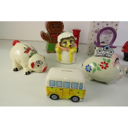 158 - Collection of assorted money boxes, piggy banks and cookie jar.