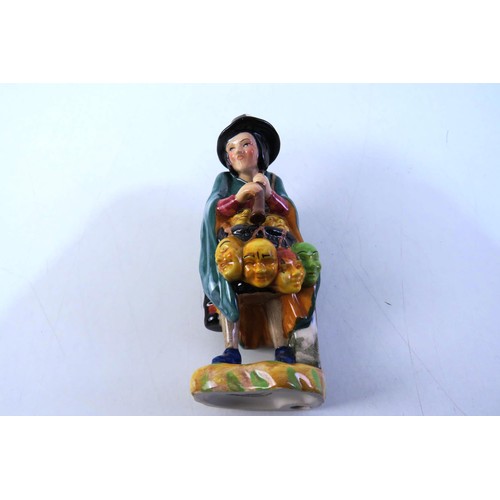 189 - Doulton figure mask seller H.N.4934