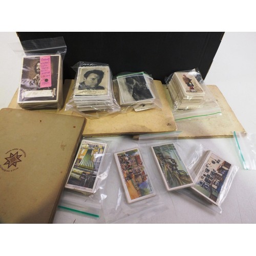 184 - Box of cigarette cards and albums.