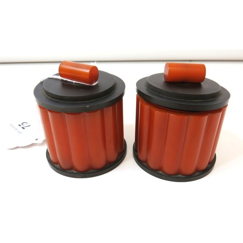 75 - A pair of 1930's  Art Deco Phenolic Catalin black & amber Bakelite trinket pots.
Height approx 7cms.