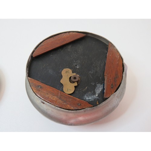 91 - Antique Victorian Aluminium vanity powder puff wind up music box with hand painted porcelain lid.
Wi... 