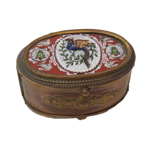 88 - An Italian micro mosaic enamelled gilt brass silk lined trinket box with hinged lid.
H4.5cms x W7.5c... 