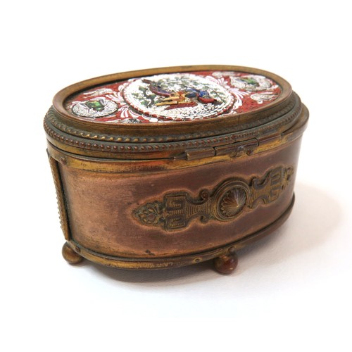 88 - An Italian micro mosaic enamelled gilt brass silk lined trinket box with hinged lid.
H4.5cms x W7.5c... 