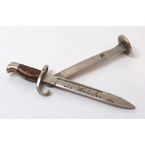 94 - WWI Waterloo souvenir miniature bayonet pipe tamper, length 7.5cms.