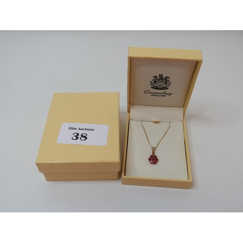 38 - 9ct Gold Ruby cluster pendant on 18