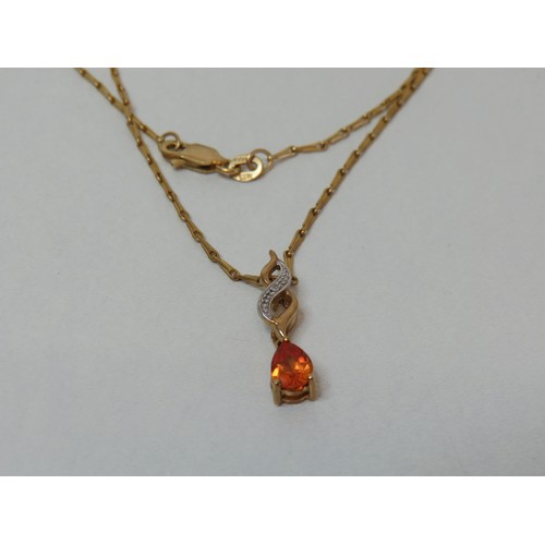 40 - 9ct Gold Topaz & Diamond pendant on 18