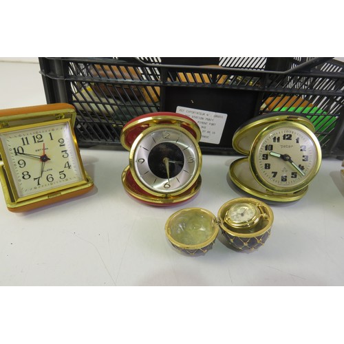 265 - Job lot of vintage travel alarm clocks.