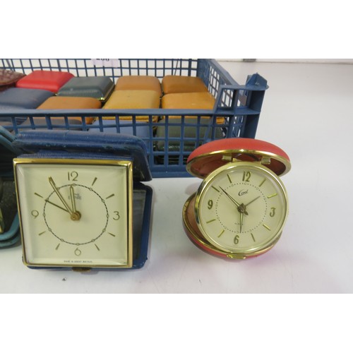 266 - Job lot of vintage travel alarm clocks.