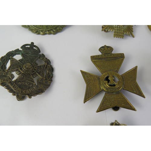 194 - Fourteen military badges