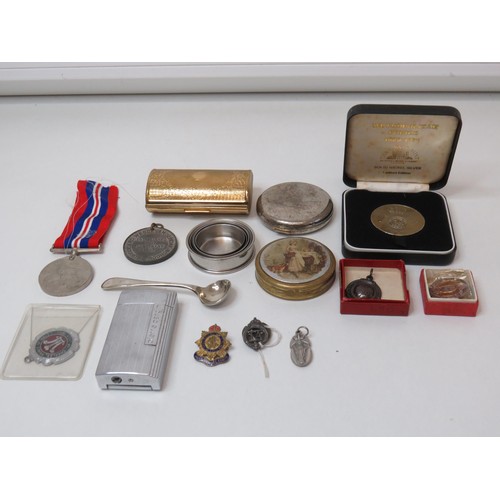 256 - Mixed lot of collectables to include silver spoon, medals, coins, cap badges, pierre cardin lighter ... 