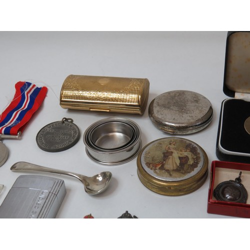 256 - Mixed lot of collectables to include silver spoon, medals, coins, cap badges, pierre cardin lighter ... 