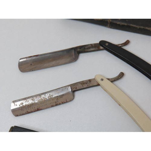 377 - Ten vintage Cut Throat Razors to include Piston cut Solingen etc.