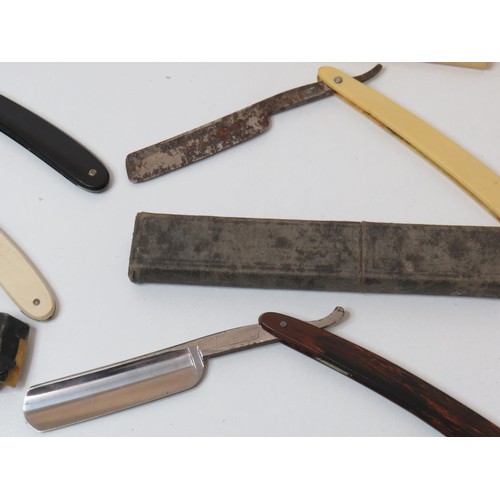 377 - Ten vintage Cut Throat Razors to include Piston cut Solingen etc.