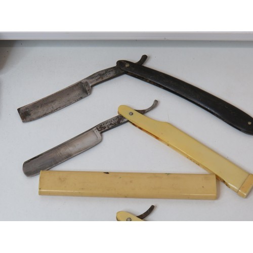 377 - Ten vintage Cut Throat Razors to include Piston cut Solingen etc.