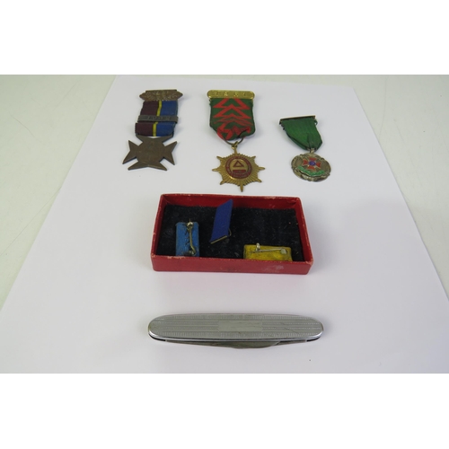 55 - Selection of medals and penknife's including silver